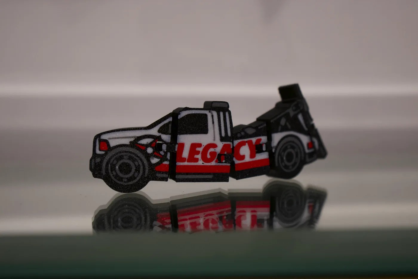 Custom branded tow truck fidget for Legacy
