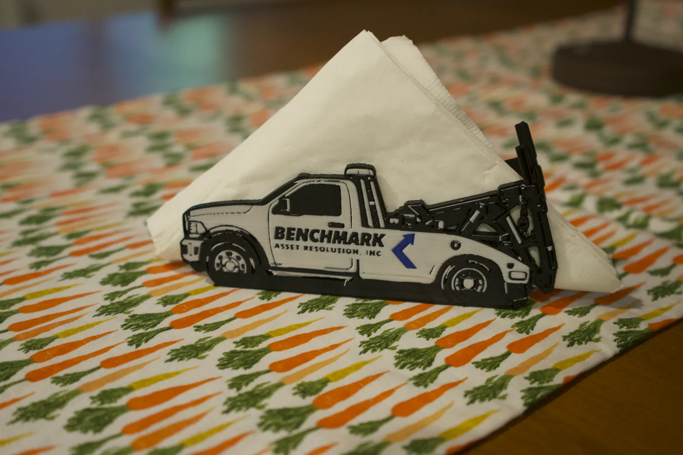 Custom branded tow truck napkin holder for Benchmark Asset Resolution
