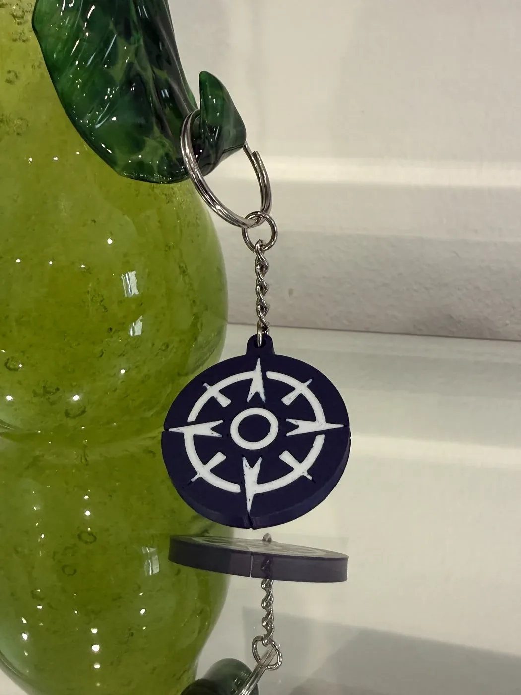 Custom True North compass keychain